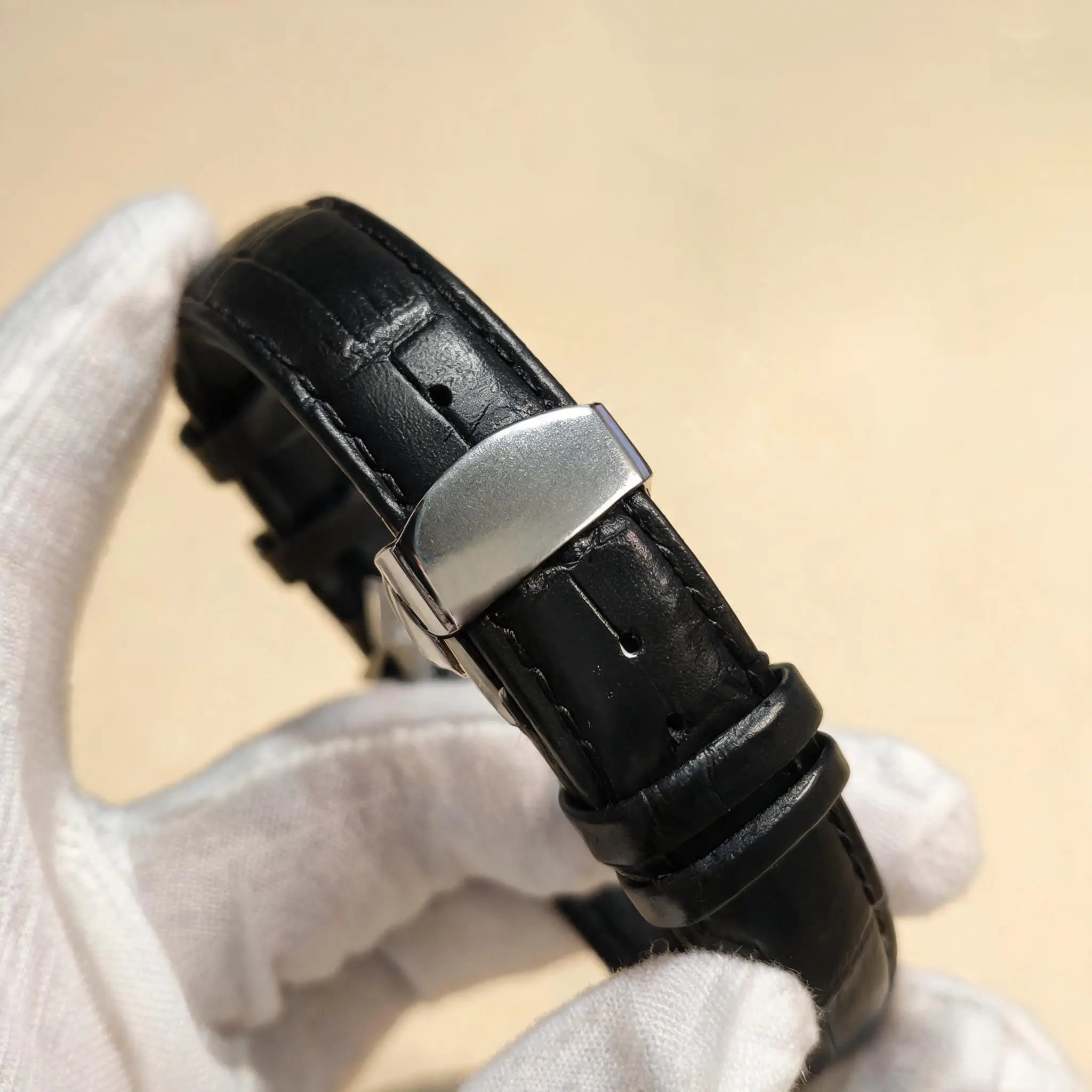 HORAE V black leather watch strap and folding clasp detail