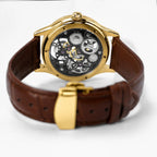 Back view of HOREAV gold mechanical watch showing exposed movement