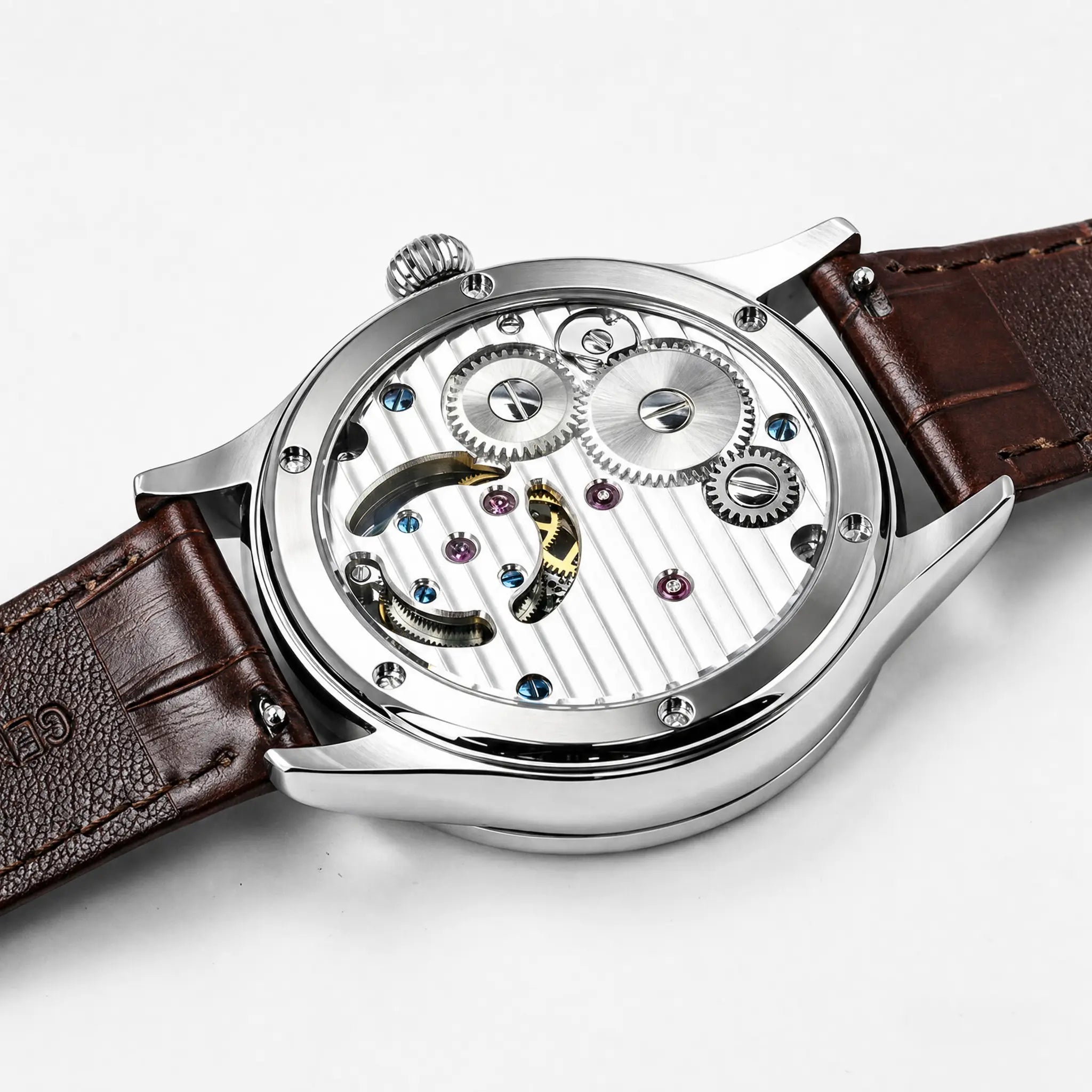 Close-up of HOREAV silver mechanical watch exhibition case back showing the movement