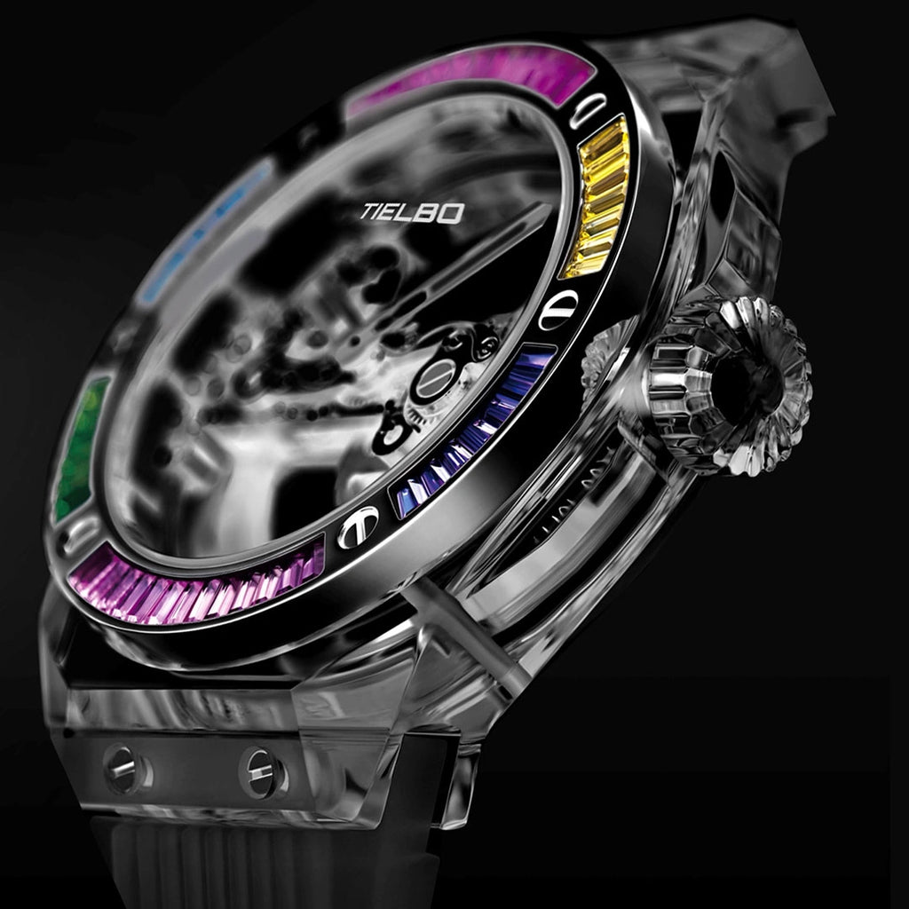 TIELBO T711 watch with clear case, rainbow bezel and black strap, close-up against a dark background.